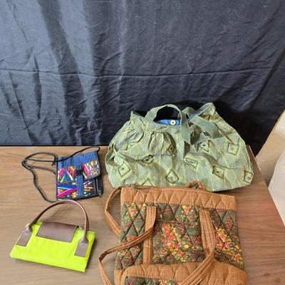 Large hobo like handbags and two smaller purses