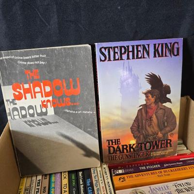 Boxes of softcover books - all different genres -