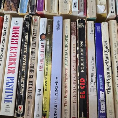 Boxes of softcover books - all different genres -