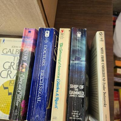 Boxes of softcover books - all different genres -