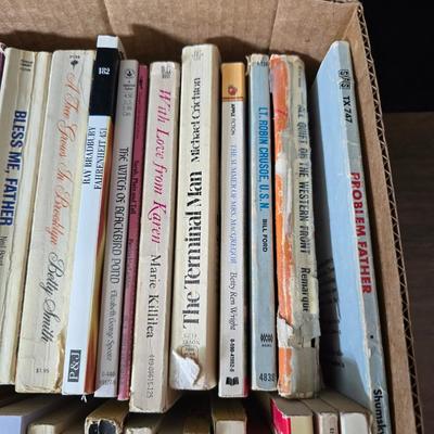 Boxes of softcover books - all different genres -