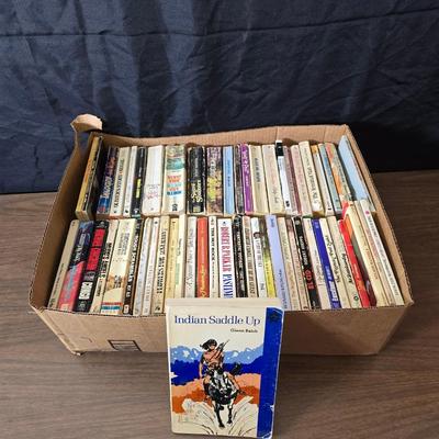 Boxes of softcover books - all different genres -