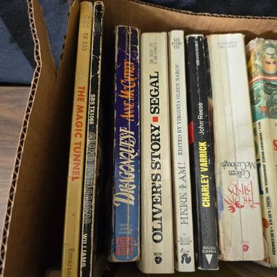 Boxes of softcover books - all different genres -