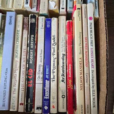Boxes of softcover books - all different genres -