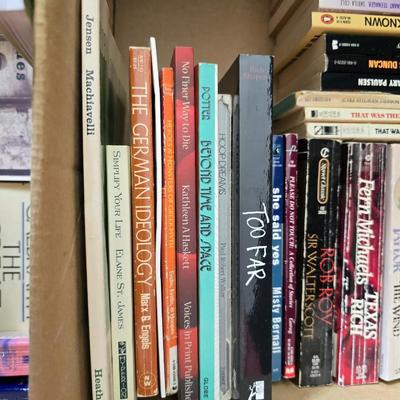 Boxes of softcover books - all different genres -