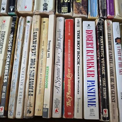 Boxes of softcover books - all different genres -