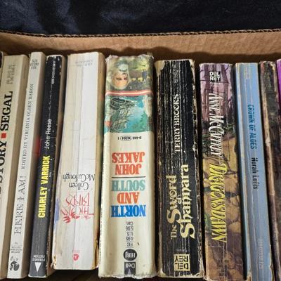 Boxes of softcover books - all different genres -