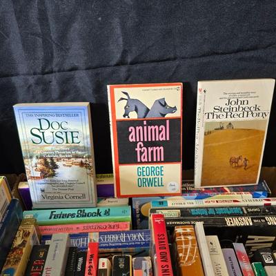 Large assortment of softback books - Steinbeck - History - George Orwell - Dickens and other great authors