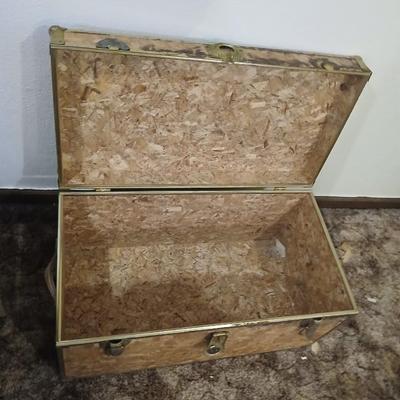 Wooden trunk with a small shelf