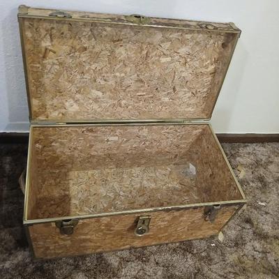 Wooden trunk with a small shelf