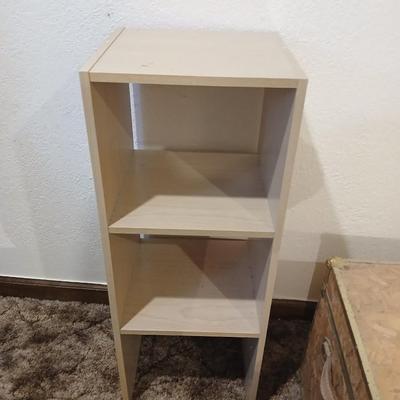 Wooden trunk with a small shelf