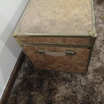 Wooden trunk with a small shelf