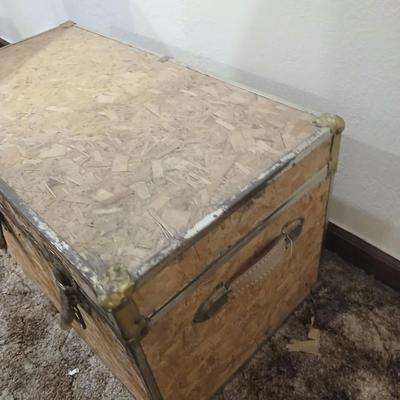 Wooden trunk with a small shelf