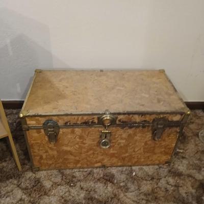 Wooden trunk with a small shelf