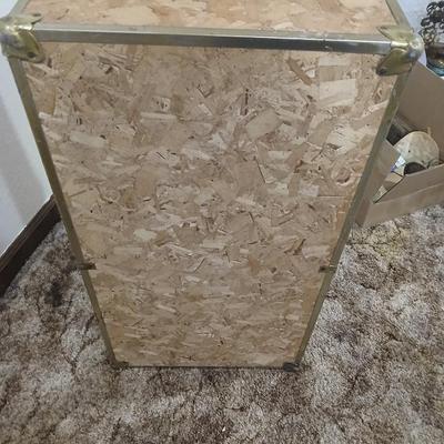 Wooden trunk with a small shelf