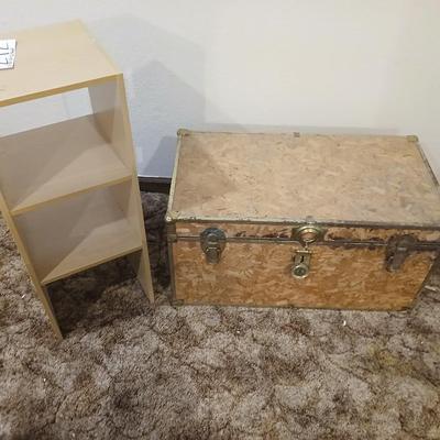 Wooden trunk with a small shelf