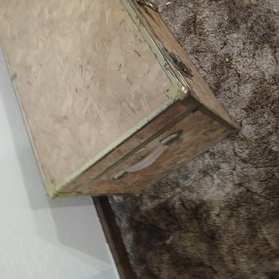 Wooden trunk with a small shelf