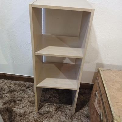 Wooden trunk with a small shelf