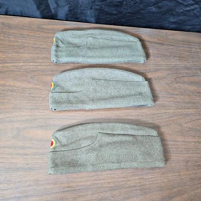 Three German wool Garrison hats, Georg Grote - signed and have NEUMÜNSTER inside the outside flap - cold war era