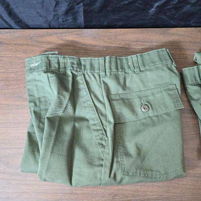 Collection of US Army OG-107 or OG-507 utility uniforms, including shirts and trousers. - See photos for size