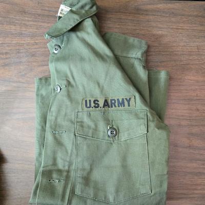 Collection of US Army OG-107 or OG-507 utility uniforms, including shirts and trousers. - See photos for size