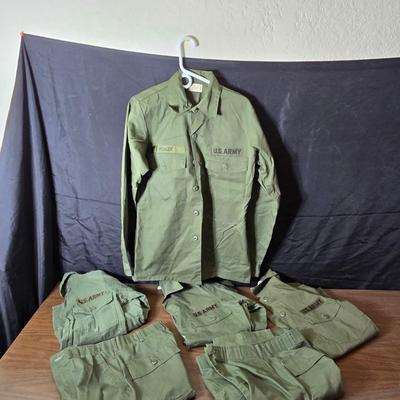 Collection of US Army OG-107 or OG-507 utility uniforms, including shirts and trousers. - See photos for size