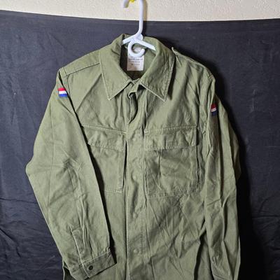vintage 1970s or 1980s French Army military jackets with some trousers