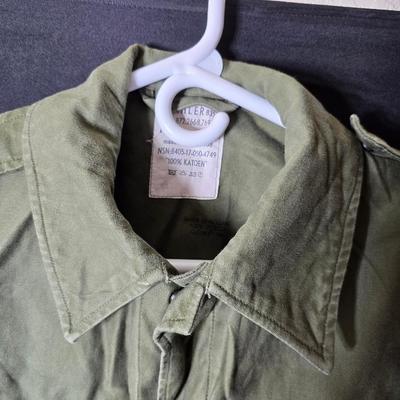 vintage 1970s or 1980s French Army military jackets with some trousers