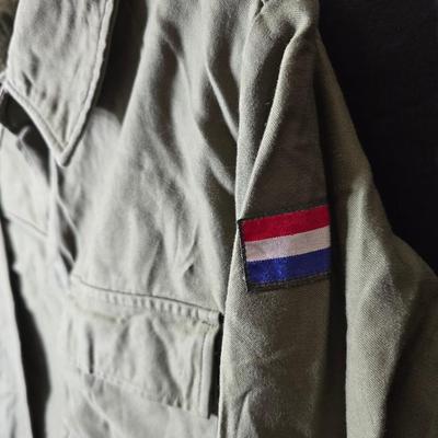 vintage 1970s or 1980s French Army military jackets with some trousers