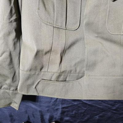 a collection of U.S. Army WWII-era wool Eisenhower, or "Ike", jacket and field shirt