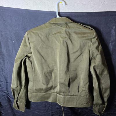 a collection of U.S. Army WWII-era wool Eisenhower, or "Ike", jacket and field shirt