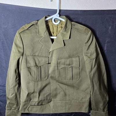 a collection of U.S. Army WWII-era wool Eisenhower, or "Ike", jacket and field shirt