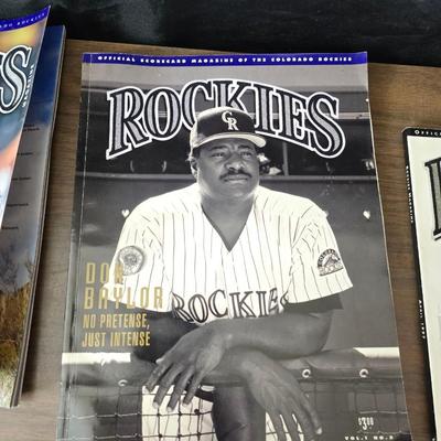 More Colorado Rockies memorabilia -Dinger Colorado Rockies mascot plush figure - hats - coins - booklets and more