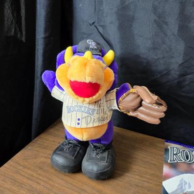More Colorado Rockies memorabilia -Dinger Colorado Rockies mascot plush figure - hats - coins - booklets and more