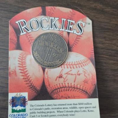 More Colorado Rockies memorabilia -Dinger Colorado Rockies mascot plush figure - hats - coins - booklets and more