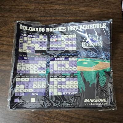 More Colorado Rockies memorabilia -Dinger Colorado Rockies mascot plush figure - hats - coins - booklets and more
