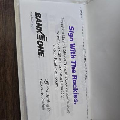 More Colorado Rockies memorabilia -Dinger Colorado Rockies mascot plush figure - hats - coins - booklets and more