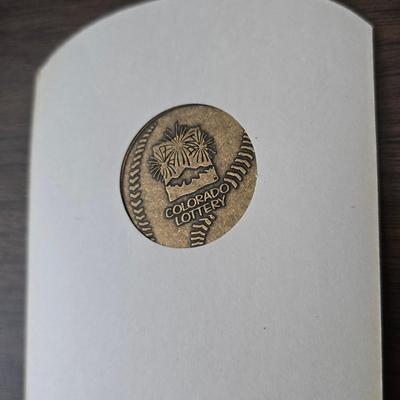 More Colorado Rockies memorabilia -Dinger Colorado Rockies mascot plush figure - hats - coins - booklets and more