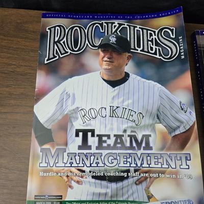 More Colorado Rockies memorabilia -Dinger Colorado Rockies mascot plush figure - hats - coins - booklets and more