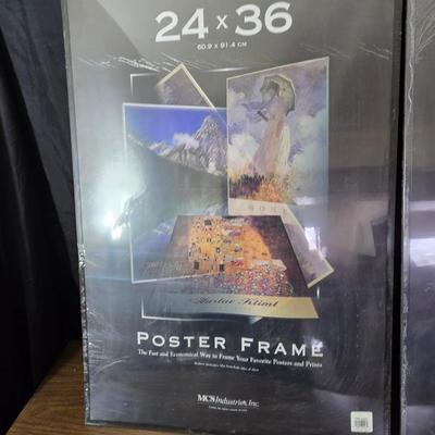 Two 24" x 36" poster frames