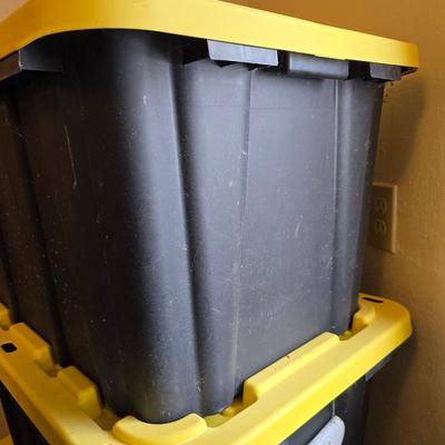 Four HDX Storage totes with yellow lids - 27 gallon