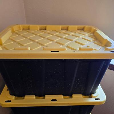 Four HDX Storage totes with yellow lids - 27 gallon