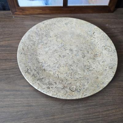 Framed artwork with a collection of pottery - and a fossil stone platter