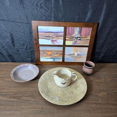 Framed artwork with a collection of pottery - and a fossil stone platter