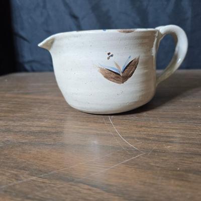 Framed artwork with a collection of pottery - and a fossil stone platter