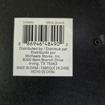 Framed artwork with a collection of pottery - and a fossil stone platter