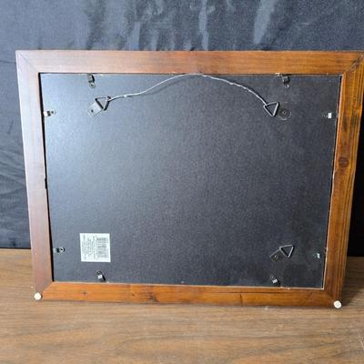 Framed artwork with a collection of pottery - and a fossil stone platter