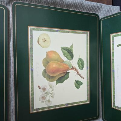 Hooker's Fruits Pimpernel cork backed placemats and matching coasters - Brass candle sticks- a tablecloth and a pottery hotplate