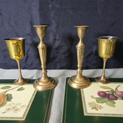 Hooker's Fruits Pimpernel cork backed placemats and matching coasters - Brass candle sticks- a tablecloth and a pottery hotplate