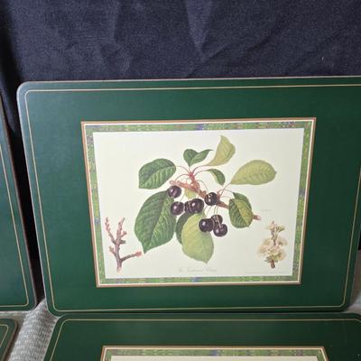 Hooker's Fruits Pimpernel cork backed placemats and matching coasters - Brass candle sticks- a tablecloth and a pottery hotplate